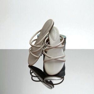 Nine West tan slides.